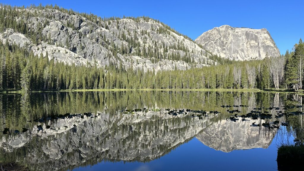 Alpine lake mirroring mountain